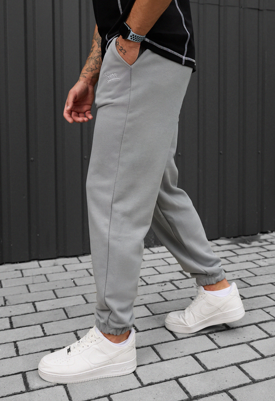 Joggeri Staff fa light gray logo